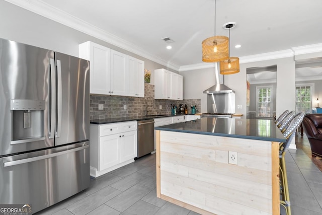 1081 Katherine Ln, Greensboro, GA 30642 - kitchen with tasteful backsplash, white cabinets, a sink, dark countertops, and stainless steel appliances