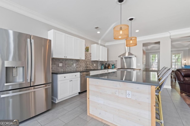 1081 Katherine Ln, Greensboro, GA 30642 - kitchen featuring white cabinetry, backsplash, dark countertops, visible vents, and appliances with stainless steel finishes