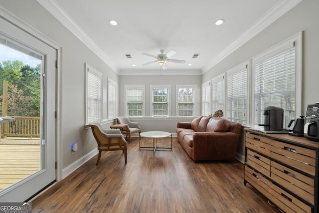 1081 Katherine Ln, Greensboro, GA 30642 - sunroom with ornamental molding, visible vents, recessed lighting, wood finished floors, and baseboards