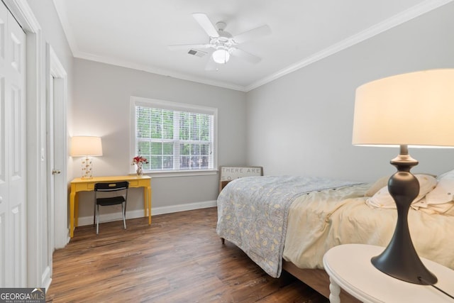 1081 Katherine Ln, Greensboro, GA 30642 - bedroom with crown molding, visible vents, baseboards, and wood finished floors