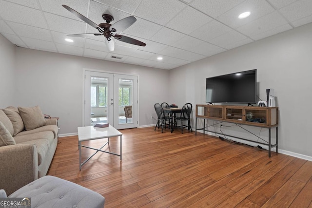 1081 Katherine Ln, Greensboro, GA 30642 - living room with a ceiling fan, visible vents, wood finished floors, french doors, and baseboards