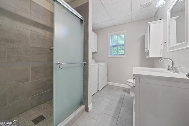 1081 Katherine Ln, Greensboro, GA 30642 - bathroom with a shower stall, visible vents, and washing machine and dryer