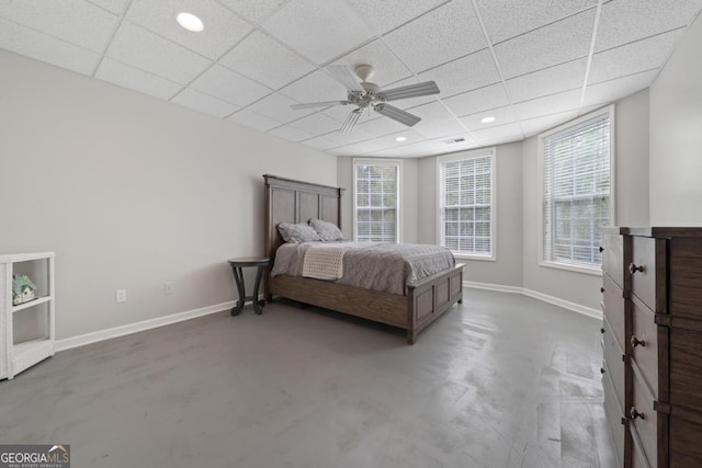 1081 Katherine Ln, Greensboro, GA 30642 - bedroom with finished concrete floors, baseboards, and a drop ceiling