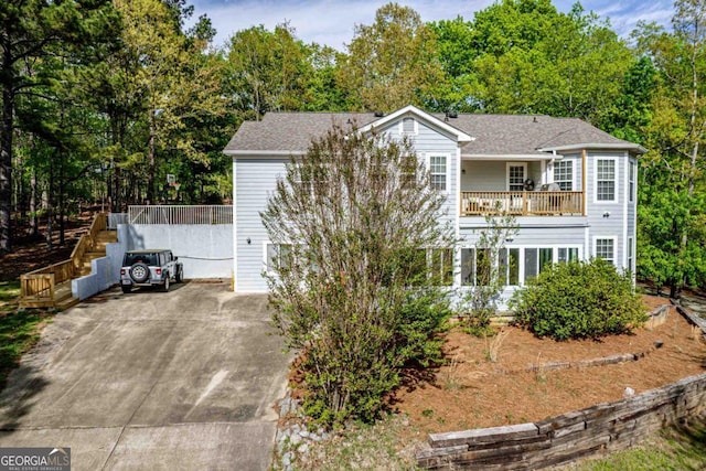 1081 Katherine Ln, Greensboro, GA 30642 - view of front of house featuring stairway, driveway, and a shingled roof