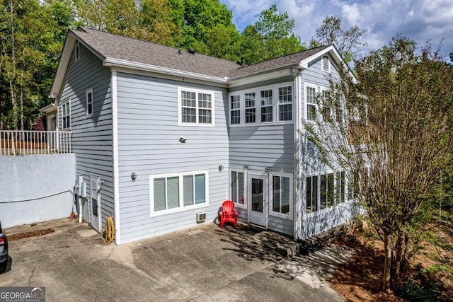 1081 Katherine Ln, Greensboro, GA 30642 - back of property with a patio and roof with shingles
