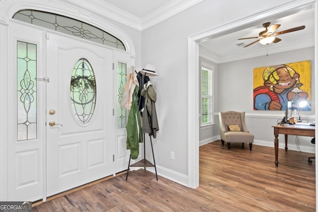 1081 Katherine Ln, Greensboro, GA 30642 - foyer entrance featuring crown molding, baseboards, and wood finished floors
