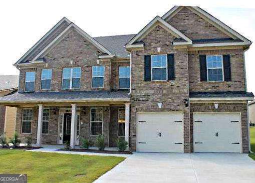 80 Lanier Rdg, Acworth, GA 30101 - craftsman-style home with brick siding, a front lawn, driveway, and a garage
