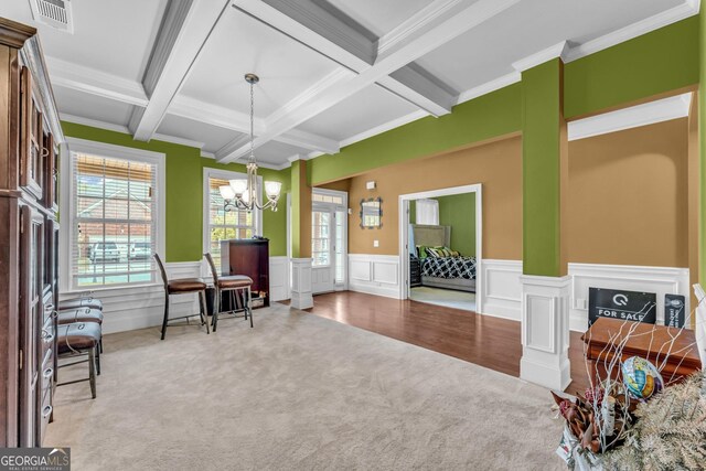80 Lanier Rdg, Acworth, GA 30101 - living area featuring carpet, an inviting chandelier, visible vents, beamed ceiling, and crown molding
