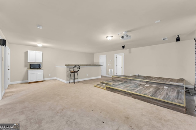 80 Lanier Rdg, Acworth, GA 30101 - misc room featuring light colored carpet, baseboards, and visible vents