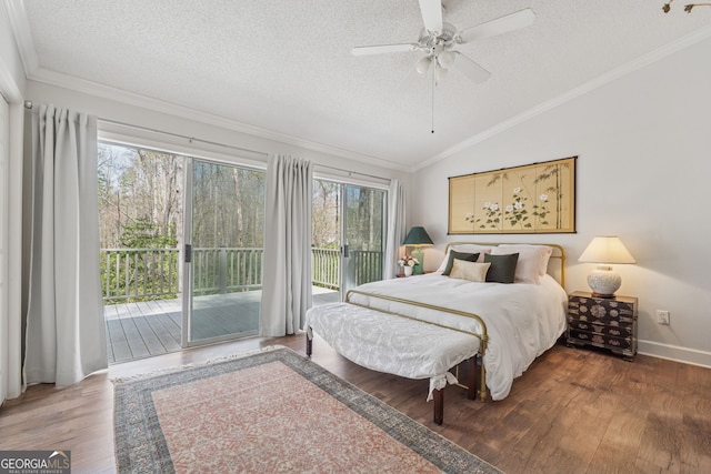 8012 Beachwood Dr, Murrayville, GA 30564 - bedroom with ornamental molding, access to outside, wood finished floors, and lofted ceiling