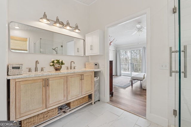 8012 Beachwood Dr, Murrayville, GA 30564 - full bathroom with a sink, ornamental molding, ceiling fan, marble finish floor, and a stall shower