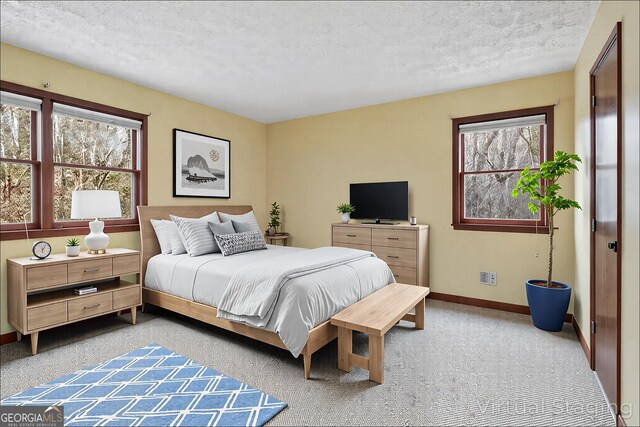 374 W Sugarbush Dr, Sky Valley, GA 30537 - bedroom with a textured ceiling and baseboards