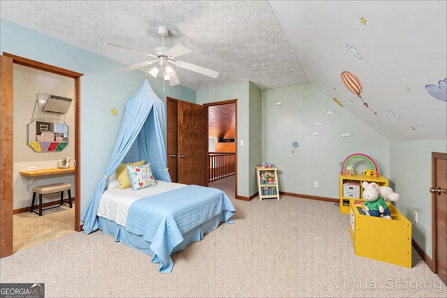 374 W Sugarbush Dr, Sky Valley, GA 30537 - bedroom with a textured ceiling, baseboards, carpet, and lofted ceiling