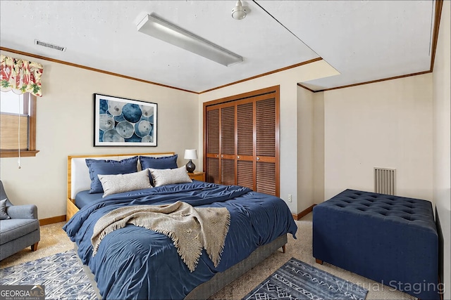 374 W Sugarbush Dr, Sky Valley, GA 30537 - carpeted bedroom with ornamental molding, visible vents, baseboards, and a closet