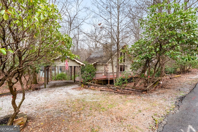 374 W Sugarbush Dr, Sky Valley, GA 30537 - view of yard featuring a carport and a wooden deck