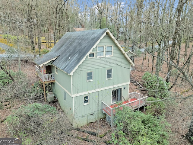 374 W Sugarbush Dr, Sky Valley, GA 30537 - view of home's exterior featuring crawl space, a shingled roof, and a deck