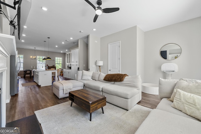 6023 Skellig St, Norcross, GA 30071 - living area featuring a ceiling fan, recessed lighting, and dark wood-type flooring