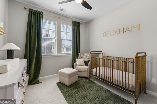 6023 Skellig St, Norcross, GA 30071 - bedroom with carpet floors, a nursery area, and a ceiling fan