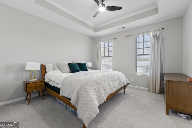 6023 Skellig St, Norcross, GA 30071 - bedroom featuring a tray ceiling, light colored carpet, ornamental molding, and a ceiling fan