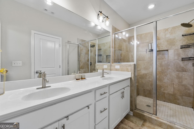 6023 Skellig St, Norcross, GA 30071 - full bathroom with double vanity and a shower stall