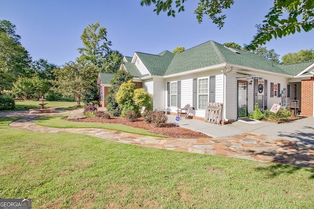 494 Thrash Rd, Lagrange, GA 30241 - view of front facade featuring a front lawn and a shingled roof