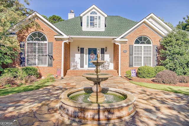 494 Thrash Rd, Lagrange, GA 30241 - view of front of home with brick siding, a chimney, and a shingled roof