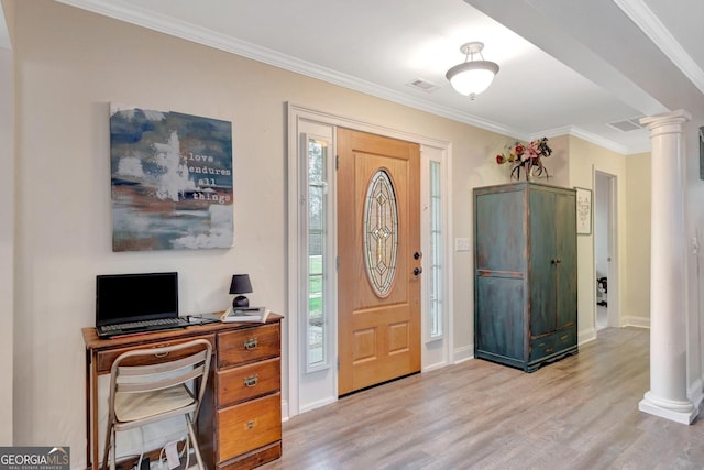 494 Thrash Rd, Lagrange, GA 30241 - entryway featuring decorative columns, light wood-style floors, ornamental molding, and baseboards