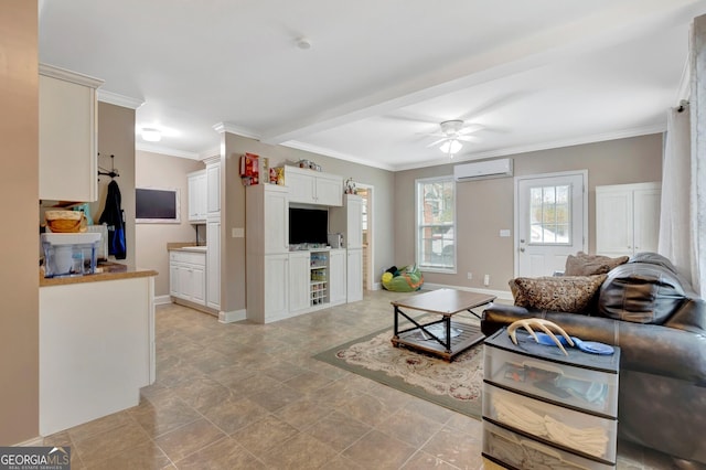494 Thrash Rd, Lagrange, GA 30241 - living area with a wall unit AC, a ceiling fan, ornamental molding, baseboards, and stone finish flooring