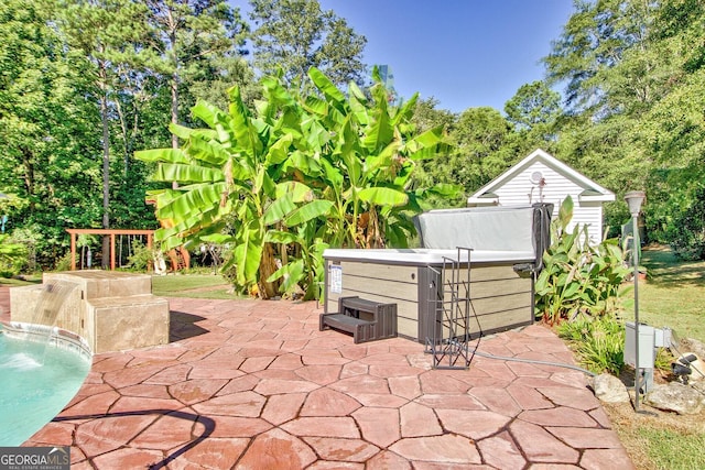 494 Thrash Rd, Lagrange, GA 30241 - view of patio / terrace featuring a hot tub and view of wooded area