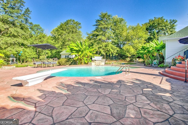 494 Thrash Rd, Lagrange, GA 30241 - outdoor pool with a diving board, a patio, view of scattered trees, and stairs