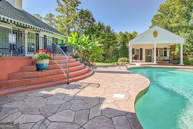 494 Thrash Rd, Lagrange, GA 30241 - outdoor pool with a patio area, an exterior structure, an outbuilding, and a ceiling fan