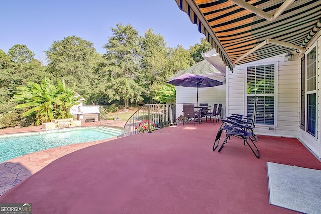 494 Thrash Rd, Lagrange, GA 30241 - swimming pool with outdoor dining area, a patio, and view of scattered trees