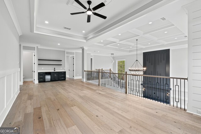 2107 E Maddox Rd, Buford, GA 30519 - interior space featuring light wood-type flooring, recessed lighting, crown molding, coffered ceiling, and ceiling fan with notable chandelier