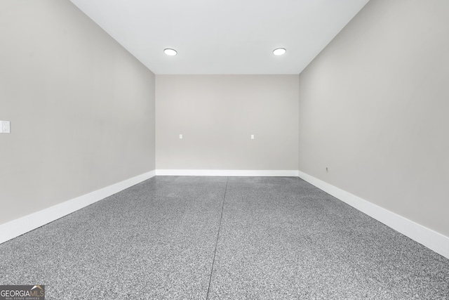 2107 E Maddox Rd, Buford, GA 30519 - spare room featuring speckled floor, baseboards, and recessed lighting