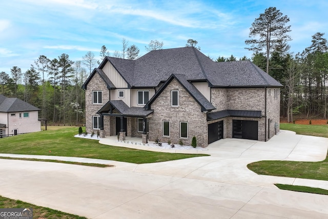 2107 E Maddox Rd, Buford, GA 30519 - view of front of home with a garage, concrete driveway, a front yard, board and batten siding, and brick siding