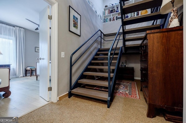 587 Virginia Ave NE Unit 314, Atlanta, GA 30306 - stairs featuring baseboards and wood finished floors