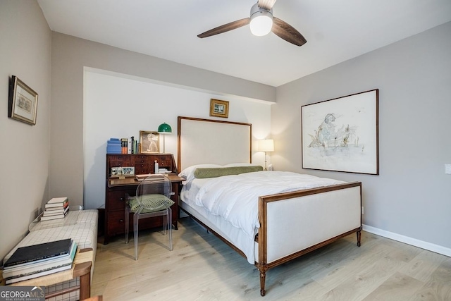 587 Virginia Ave NE Unit 314, Atlanta, GA 30306 - bedroom with ceiling fan, light wood-style flooring, and baseboards