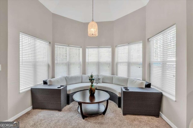 3800 Macland Rd, Hiram, GA 30141 - carpeted living area with high vaulted ceiling, plenty of natural light, and a chandelier
