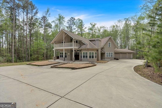 3800 Macland Rd, Hiram, GA 30141 - view of front of home with a balcony, driveway, and a porch