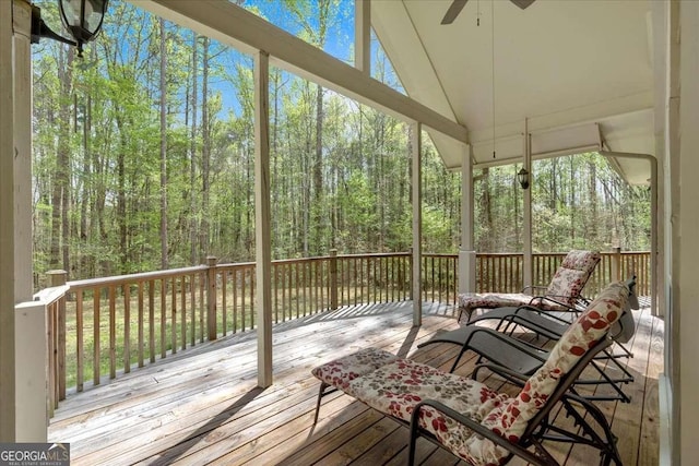 3800 Macland Rd, Hiram, GA 30141 - sunroom featuring a ceiling fan, a wooded view, and vaulted ceiling