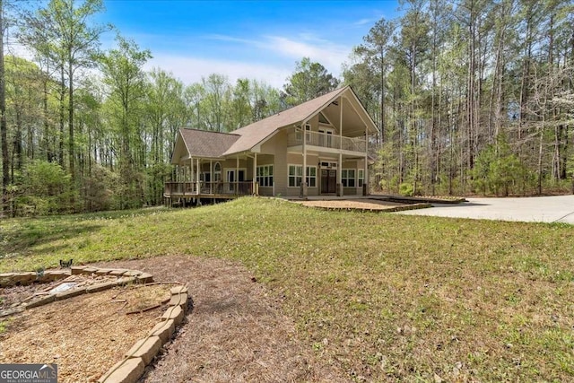 3800 Macland Rd, Hiram, GA 30141 - back of property with a lawn and a forest view