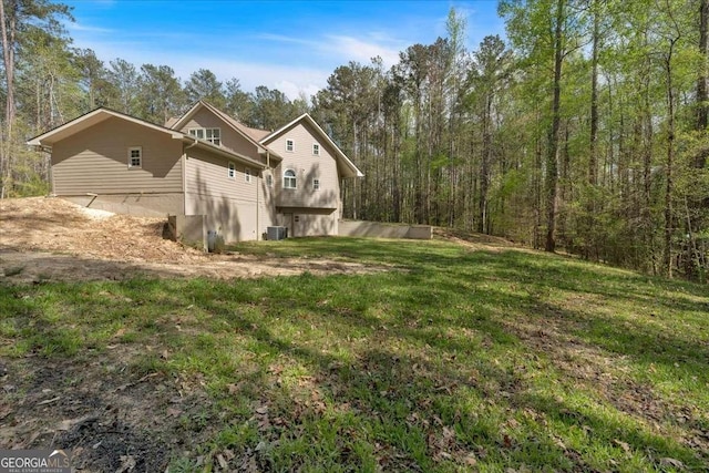 3800 Macland Rd, Hiram, GA 30141 - view of property exterior featuring a central air condition unit and a yard