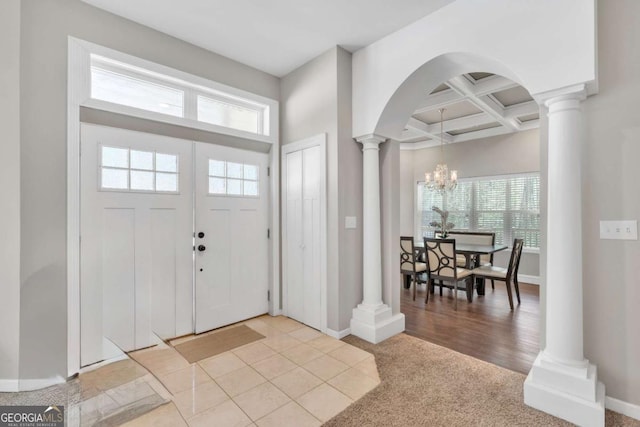 3800 Macland Rd, Hiram, GA 30141 - entryway with ornate columns, coffered ceiling, arched walkways, a chandelier, and beam ceiling