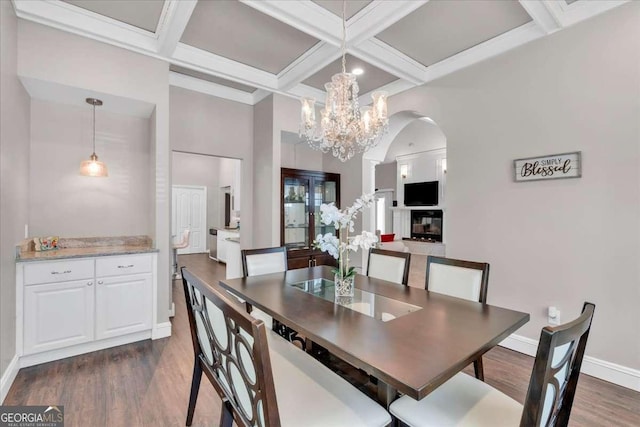 3800 Macland Rd, Hiram, GA 30141 - dining space with coffered ceiling, dark wood-type flooring, arched walkways, a chandelier, and beamed ceiling