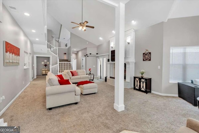 3800 Macland Rd, Hiram, GA 30141 - living area featuring carpet flooring, a ceiling fan, stairs, high vaulted ceiling, and recessed lighting