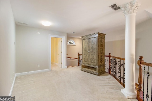 1418 Brighton Pl, Loganville, GA 30052 - unfurnished room featuring carpet, baseboards, and ornate columns
