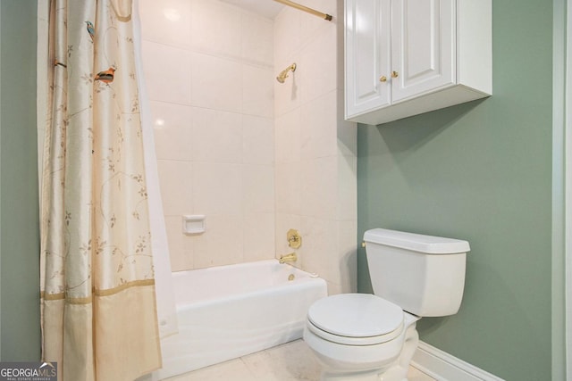 1418 Brighton Pl, Loganville, GA 30052 - bathroom with shower / bath combo with shower curtain, toilet, and baseboards