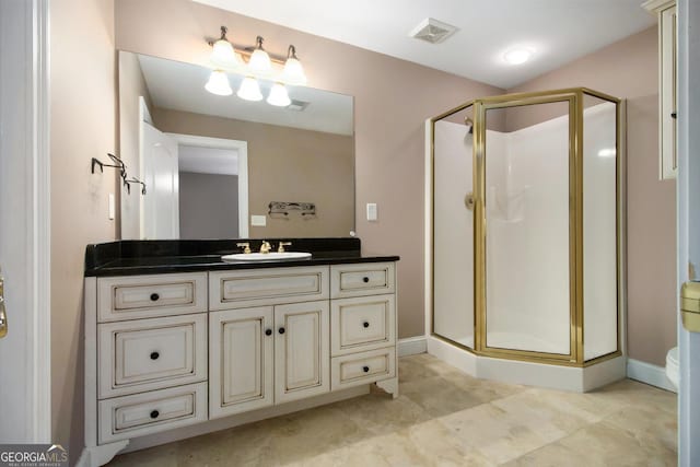 1418 Brighton Pl, Loganville, GA 30052 - bathroom with a shower stall, vanity, baseboards, and toilet
