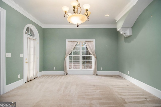 1418 Brighton Pl, Loganville, GA 30052 - carpeted spare room featuring a chandelier, ornamental molding, and baseboards
