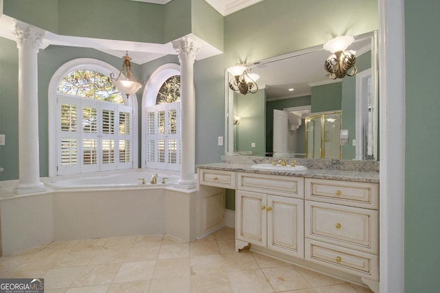 1418 Brighton Pl, Loganville, GA 30052 - bathroom with ornate columns, vanity, a garden tub, ornamental molding, and tile patterned flooring